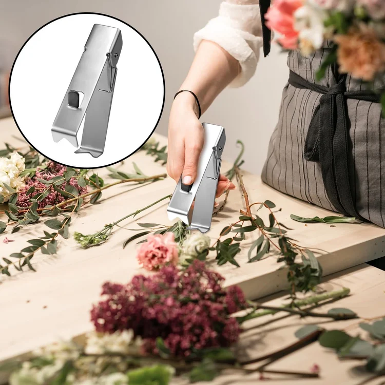 Flowers being prepared with a stem-stripping tool